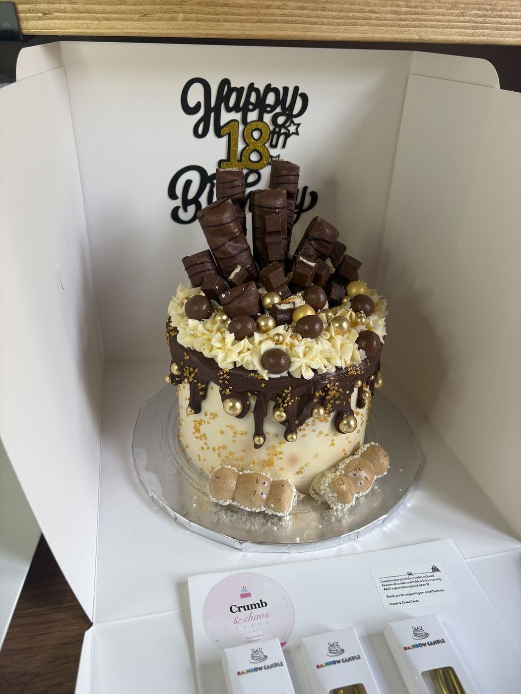 Chocolate drip 18th birthday cake topped with Kinder Bueno and Maltesers