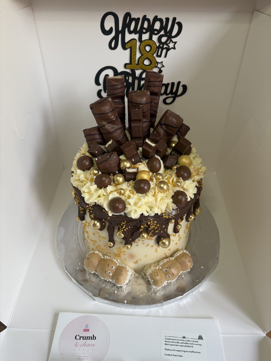 Chocolate drip celebration cake with gold detailing